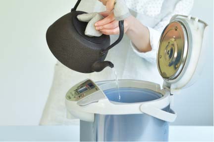 Throw away all the hot water in the iron kettle